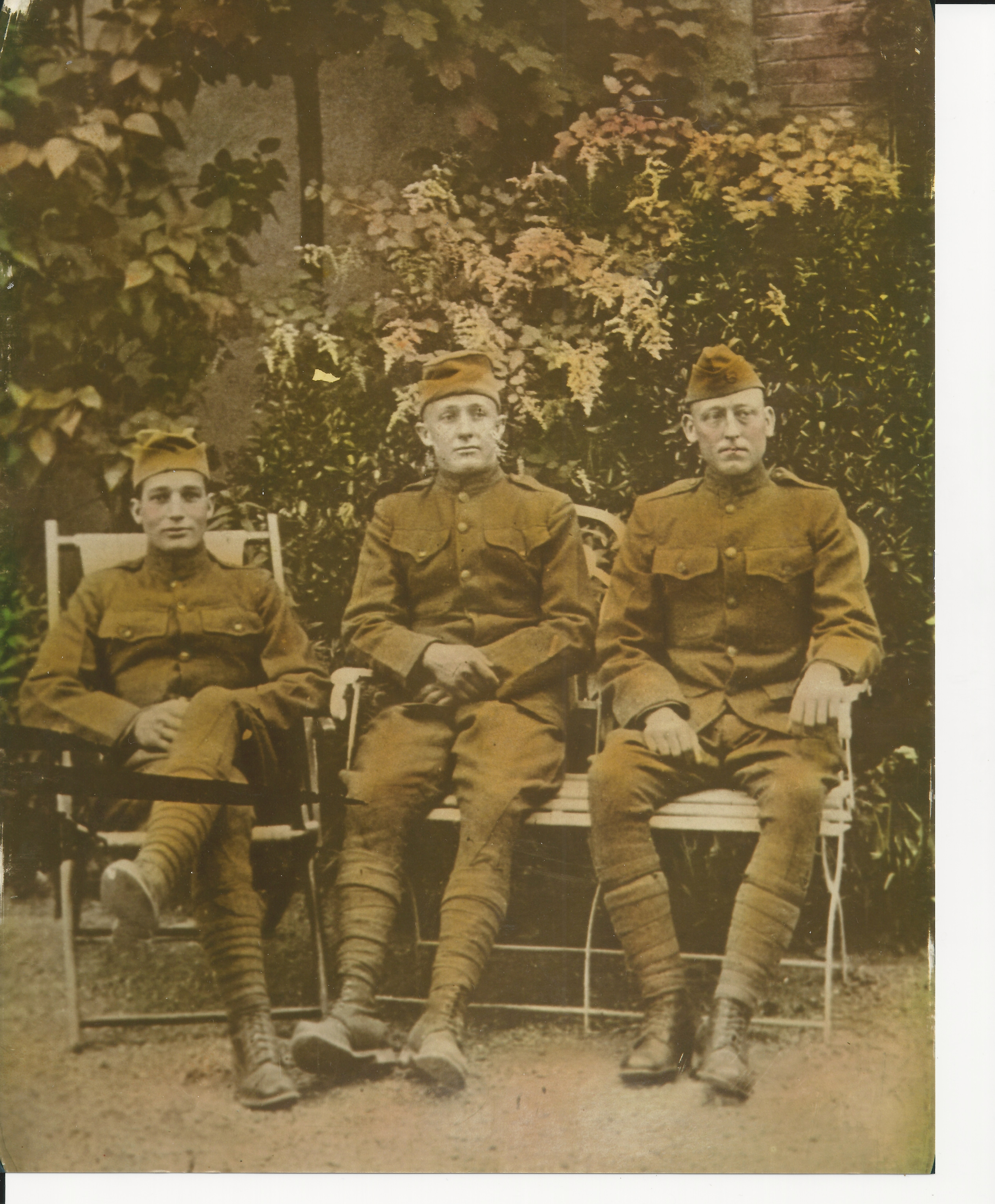 Three World War I soldiers. Sam Roberts is in the middle.